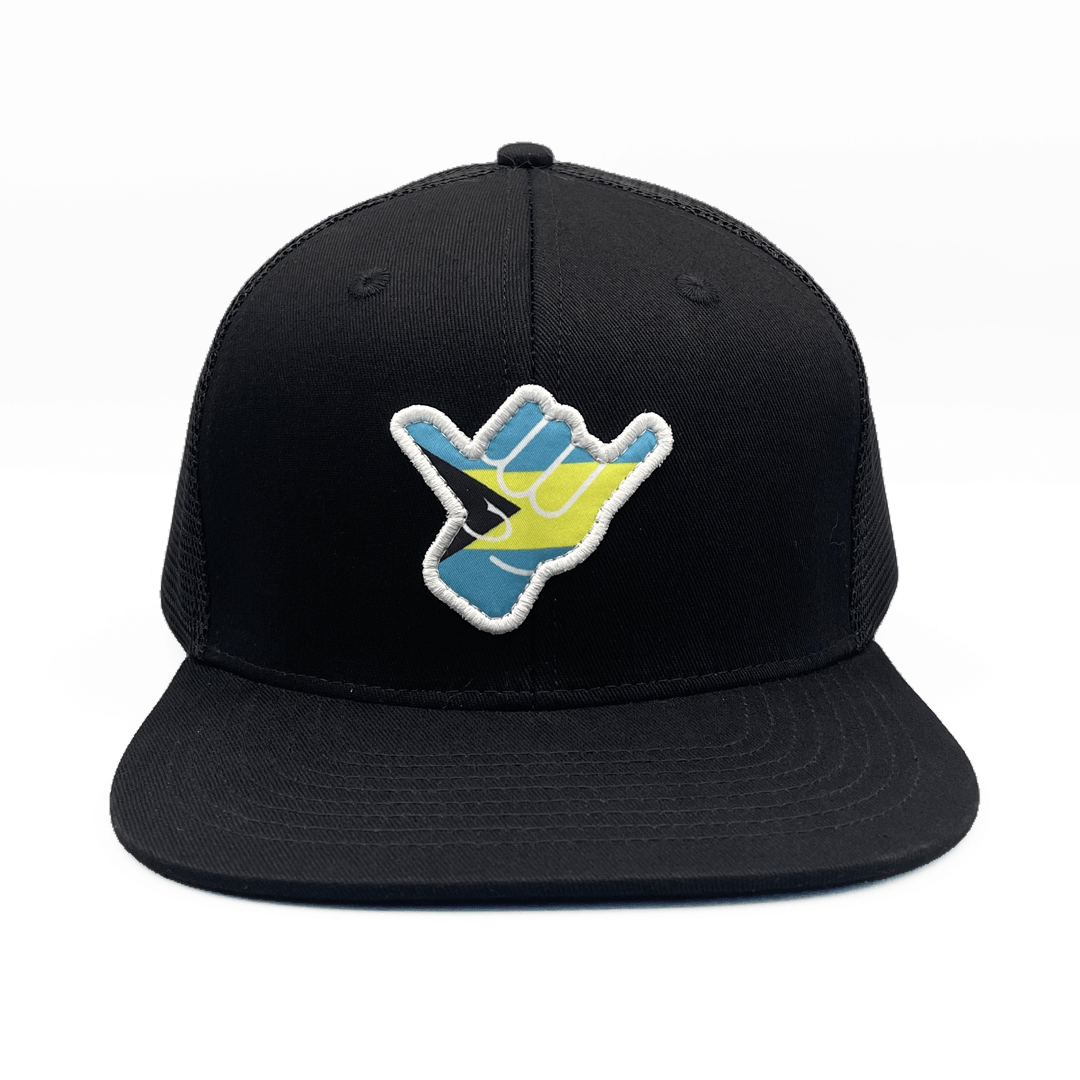 Black cap with a colorful Shaka bahamas themed logo on a white background