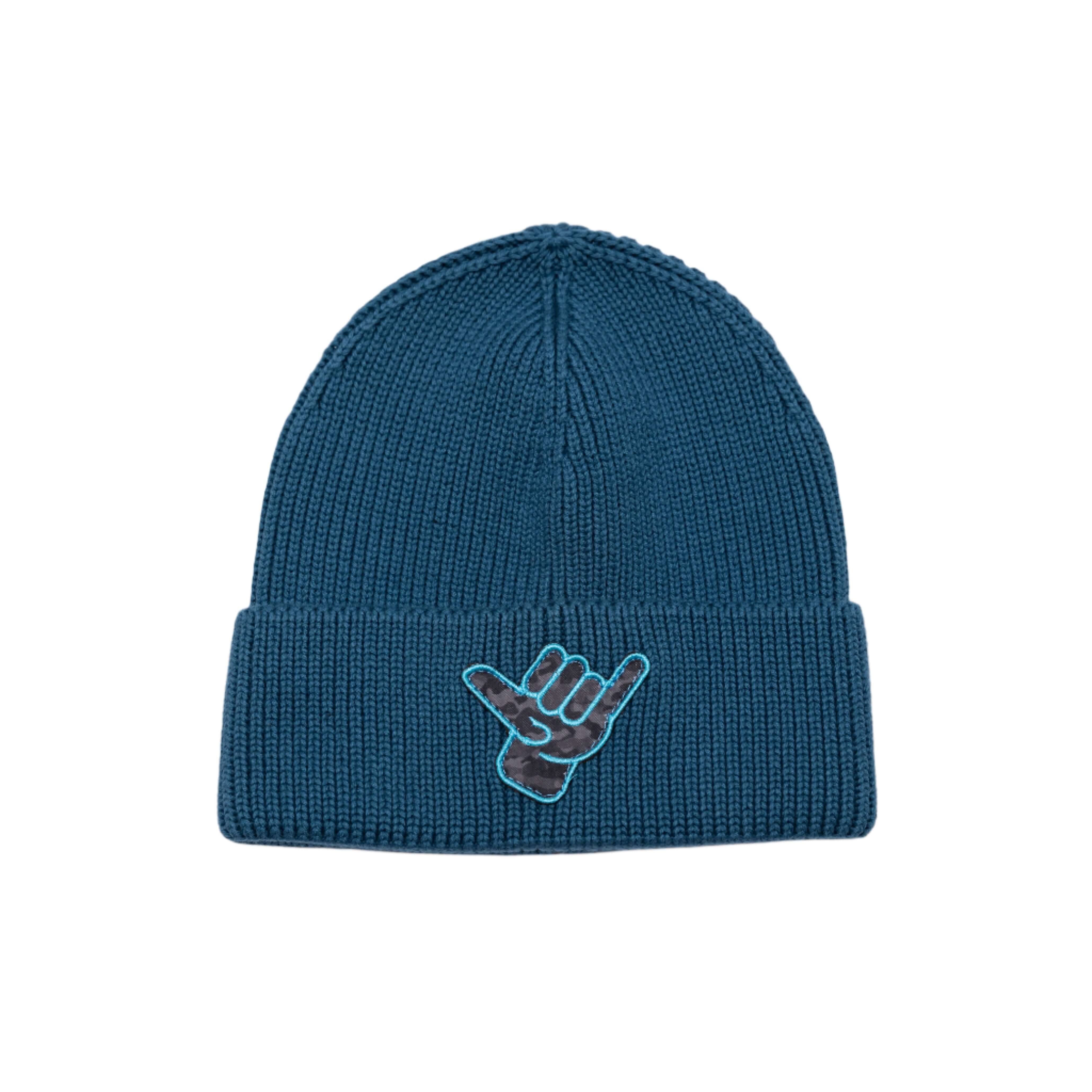 OG Shaka Beanie in blue with a custom Shaka Kai logo patch on the brim, designed for warmth and style.