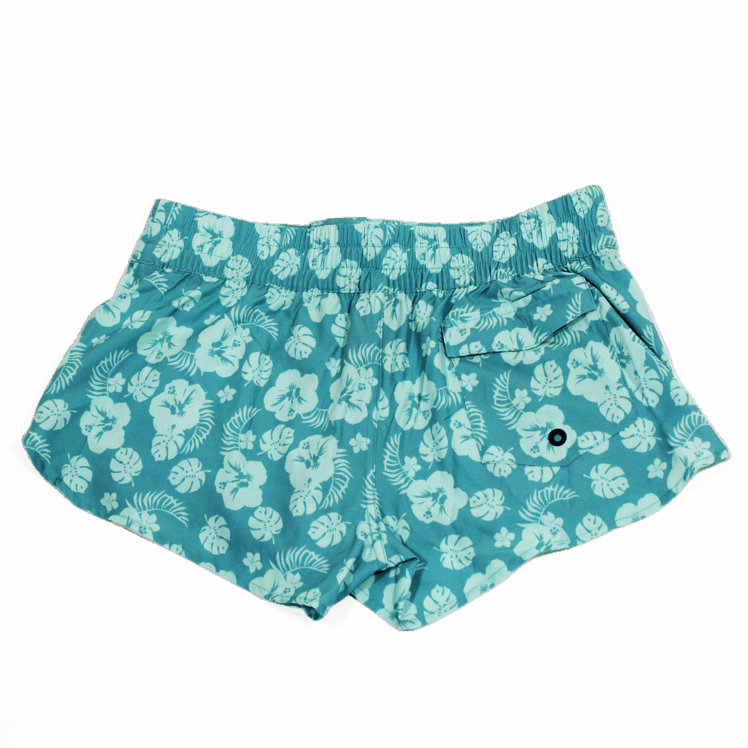 Plumeria Volley Shorts in teal with floral design, perfect for beach wear and active movement.