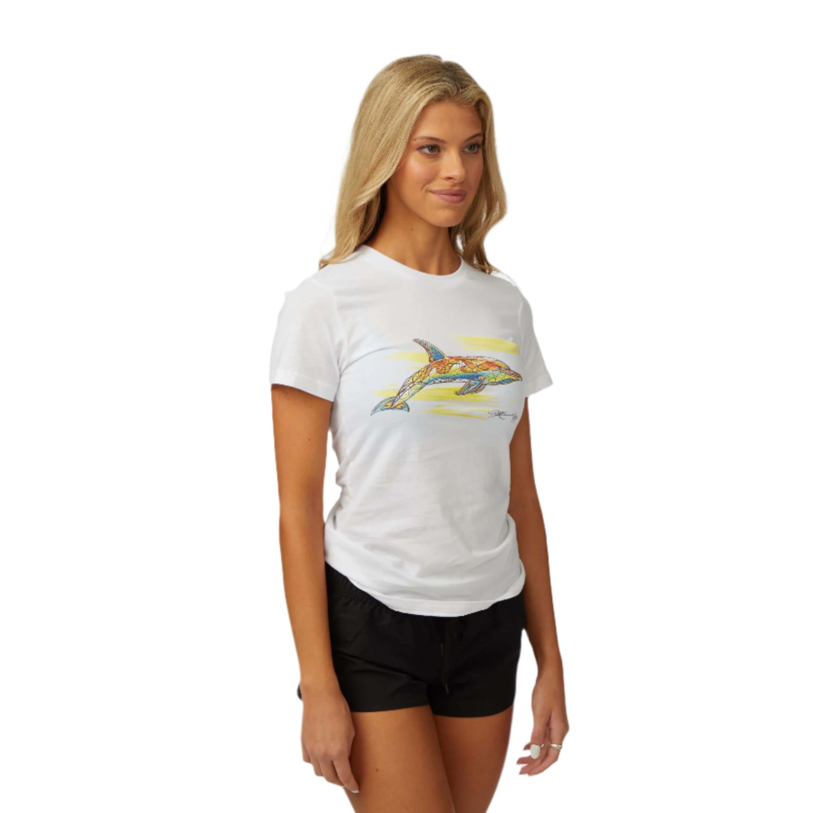Woman wearing a white DaveL Lumba Lumba T-Shirt featuring vibrant marine art.