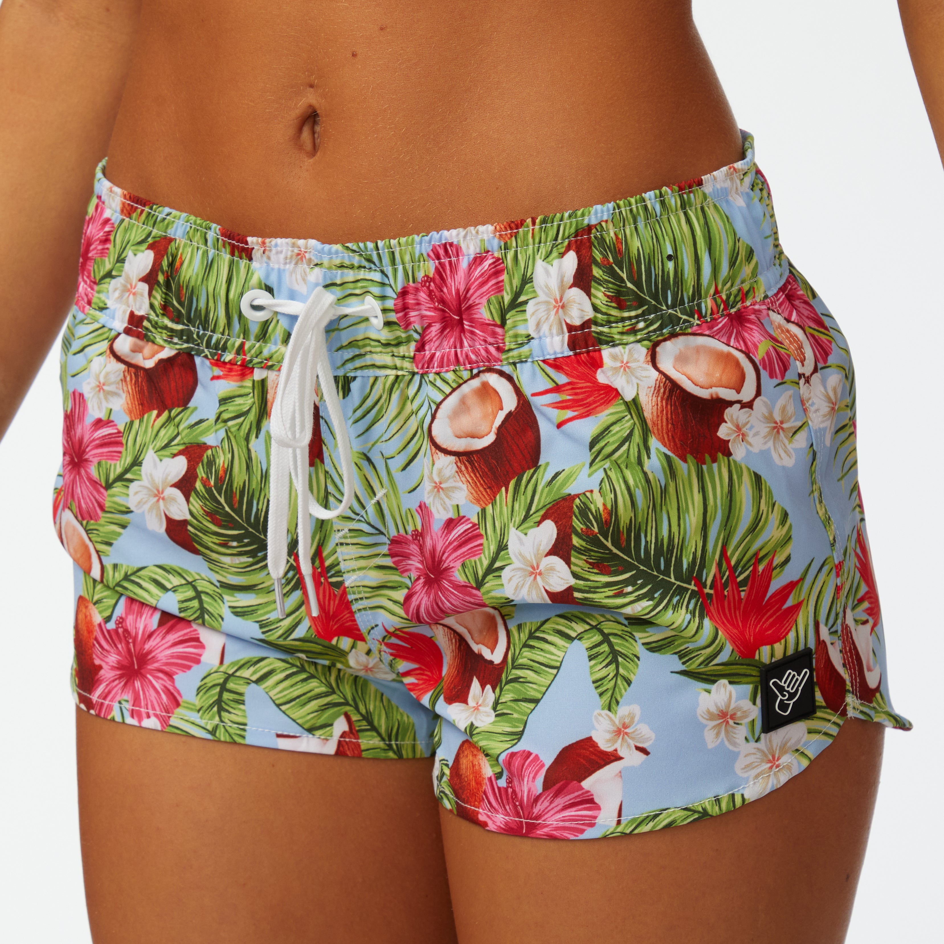 Coco Loco Volley Short featuring a vibrant floral pattern and comfortable fit for beach activities.
