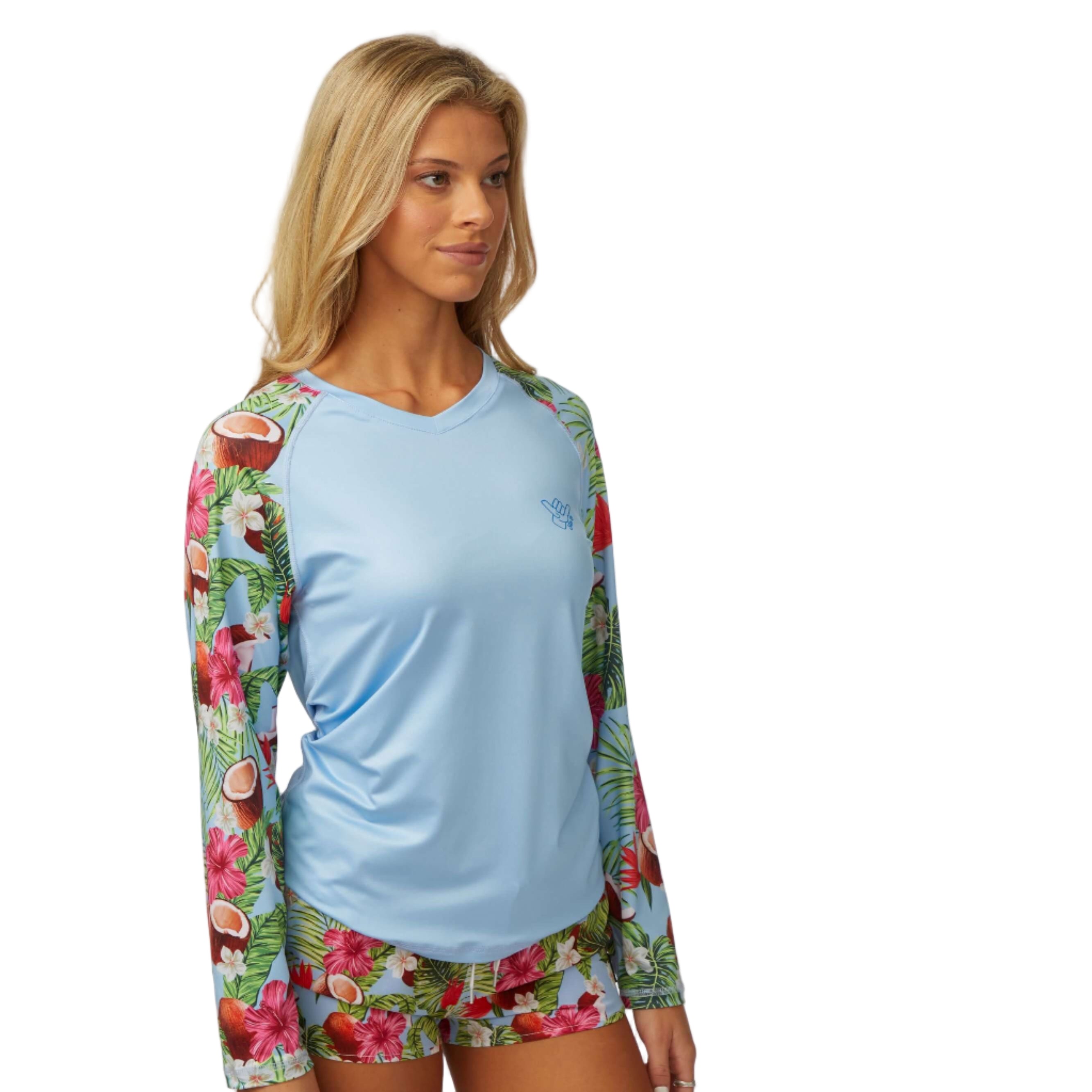 Coco Loco LS Performance Shirt UPF 50, featuring floral sleeves and breathable fabric for sun protection and comfort.