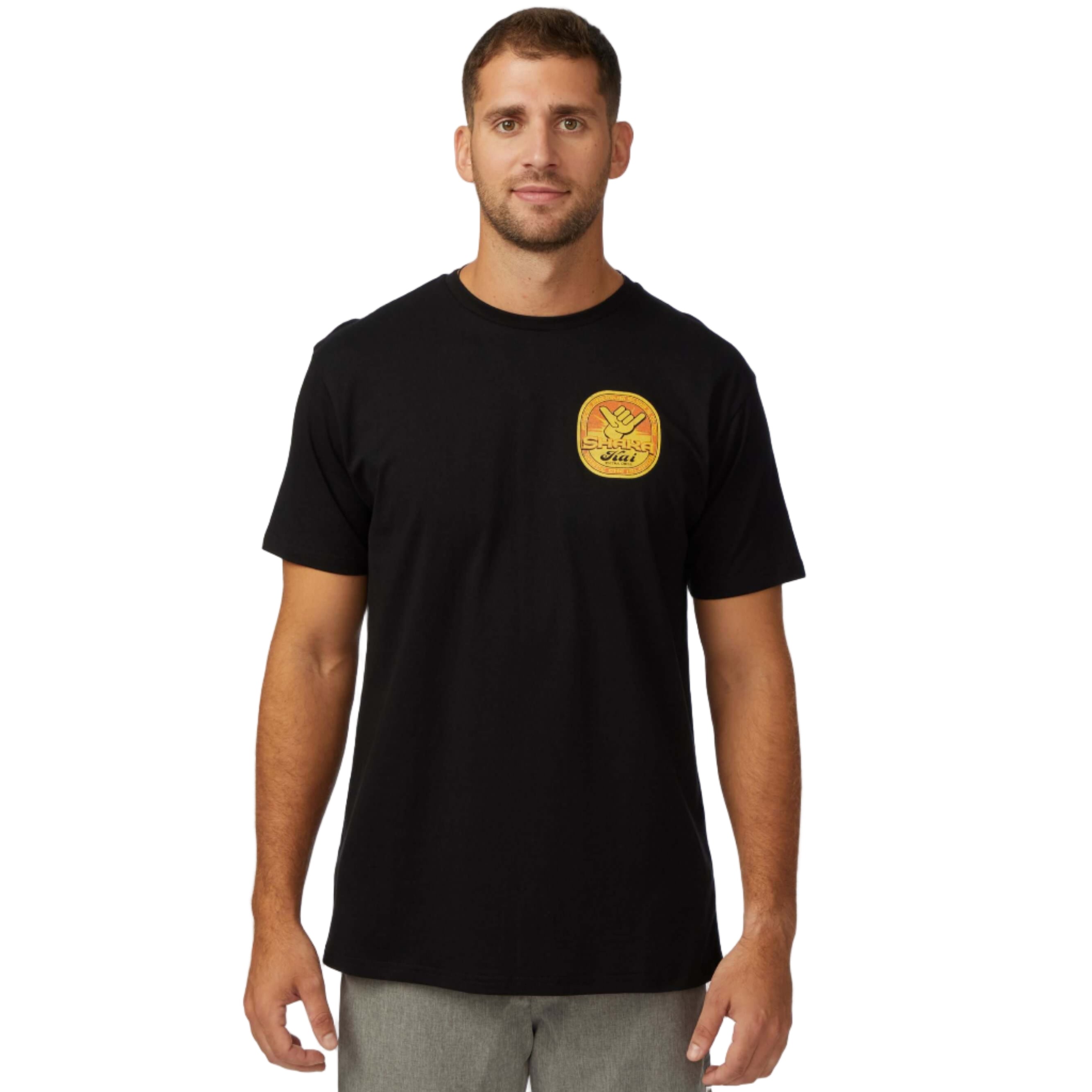 Model wearing a Tapped Out T-Shirt in black, featuring a colorful logo on the chest for an adventurous style.