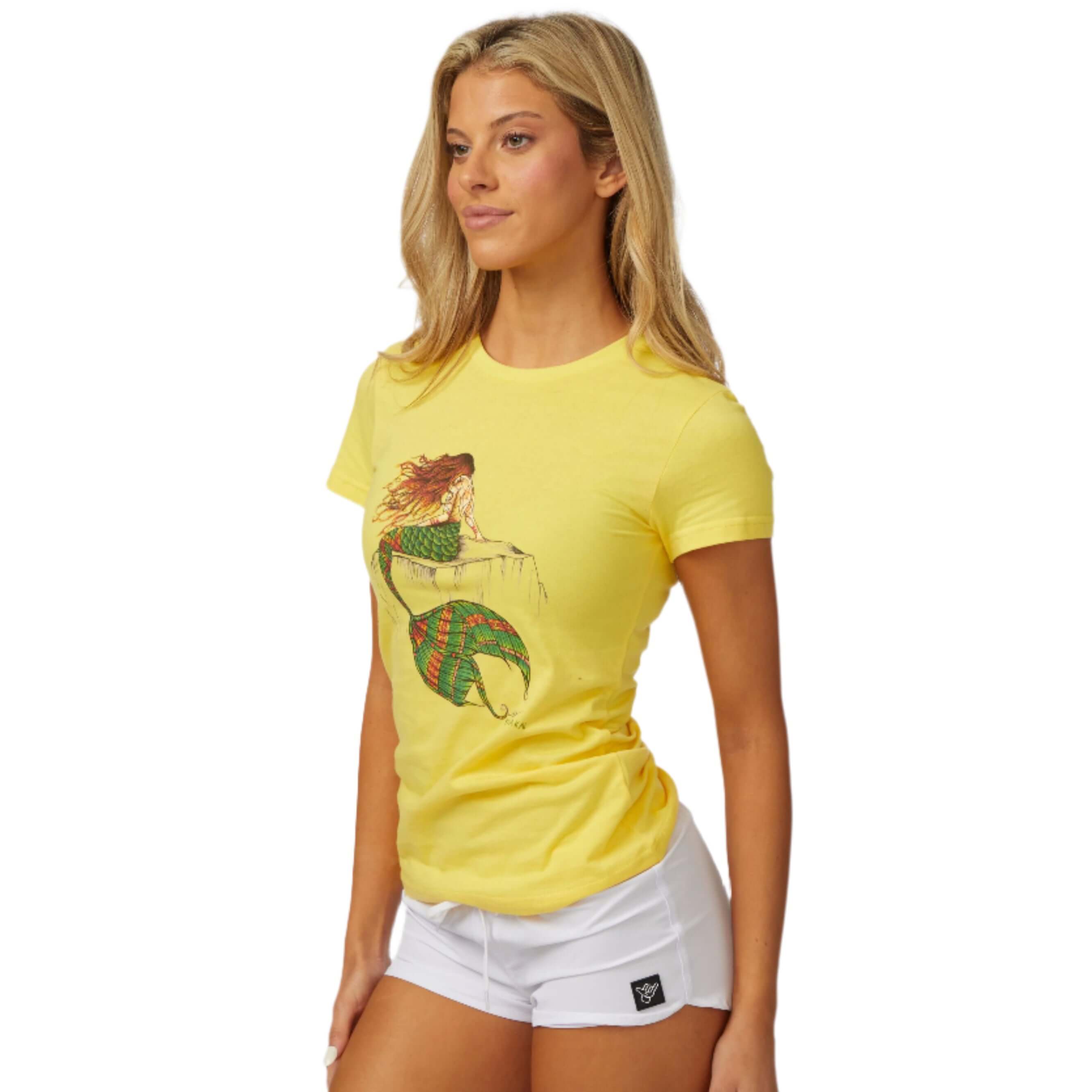 DaveL Nixi T-Shirt worn by a model, showcasing its vibrant color and unique art design, perfect for island vibes.