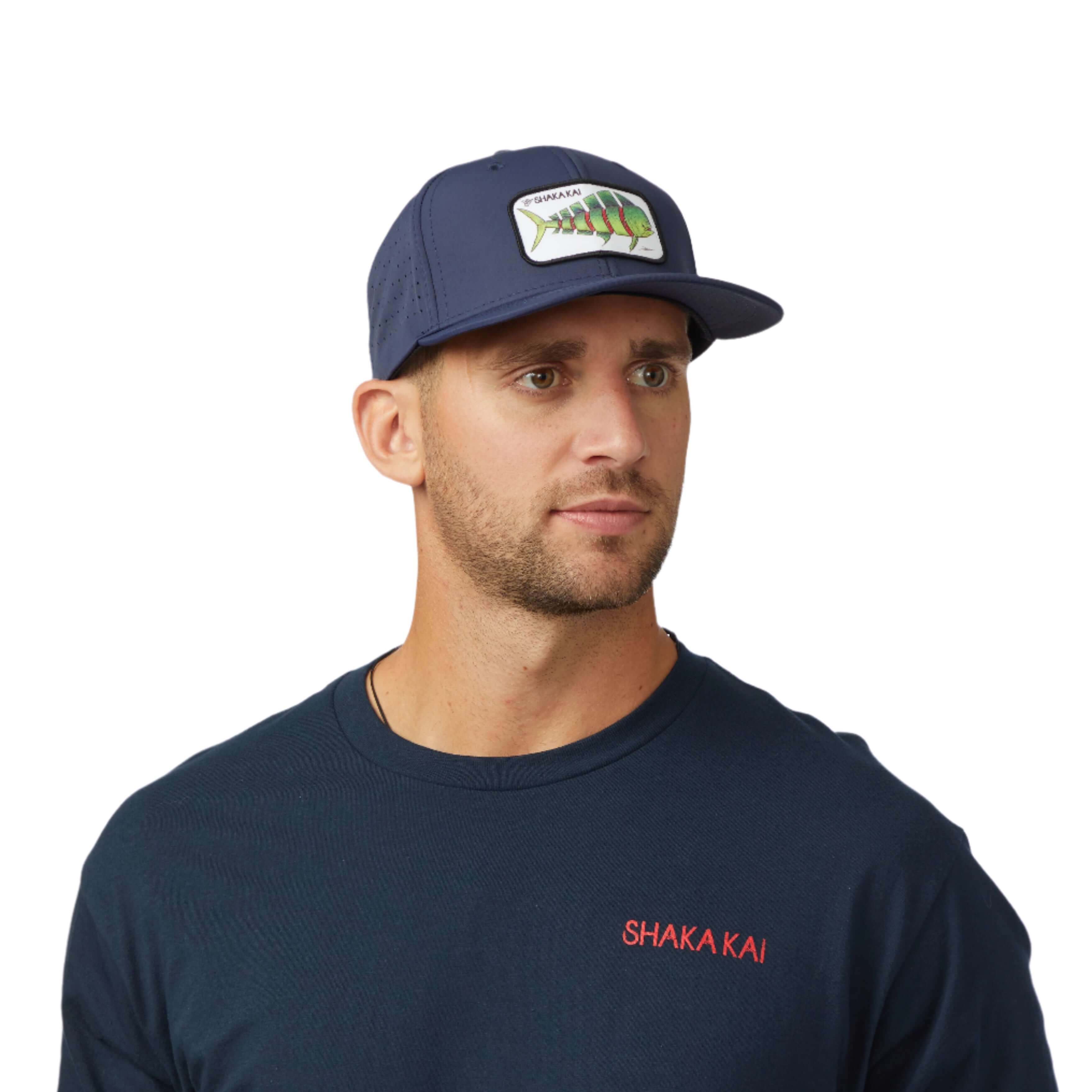 Man wearing DaveL Shaka-Shimi Mahi Ultra Fit hat, showcasing island style and performance in outdoor fashion.