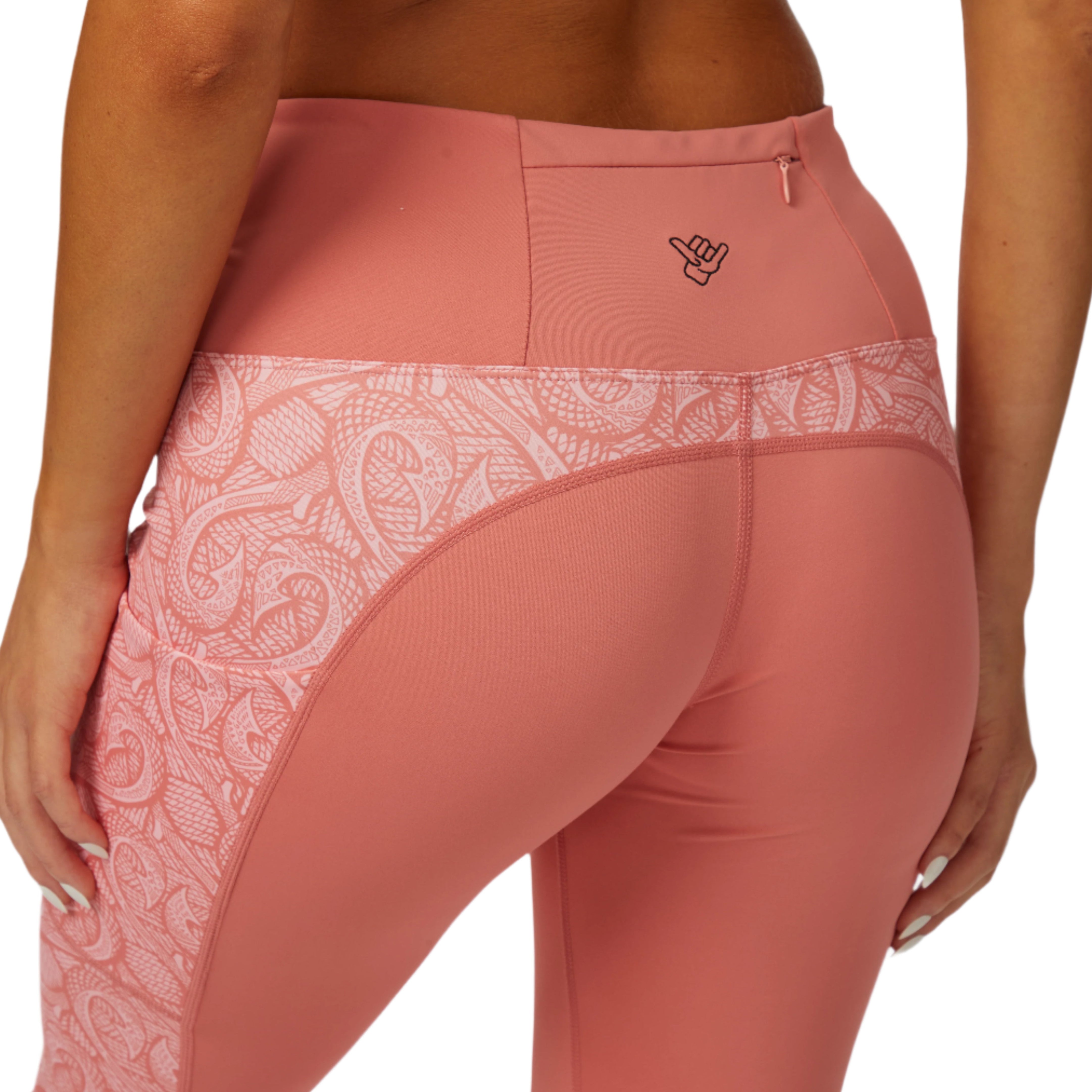 Back view of Makau Leggings showcasing stylish design and dual pockets for functionality.