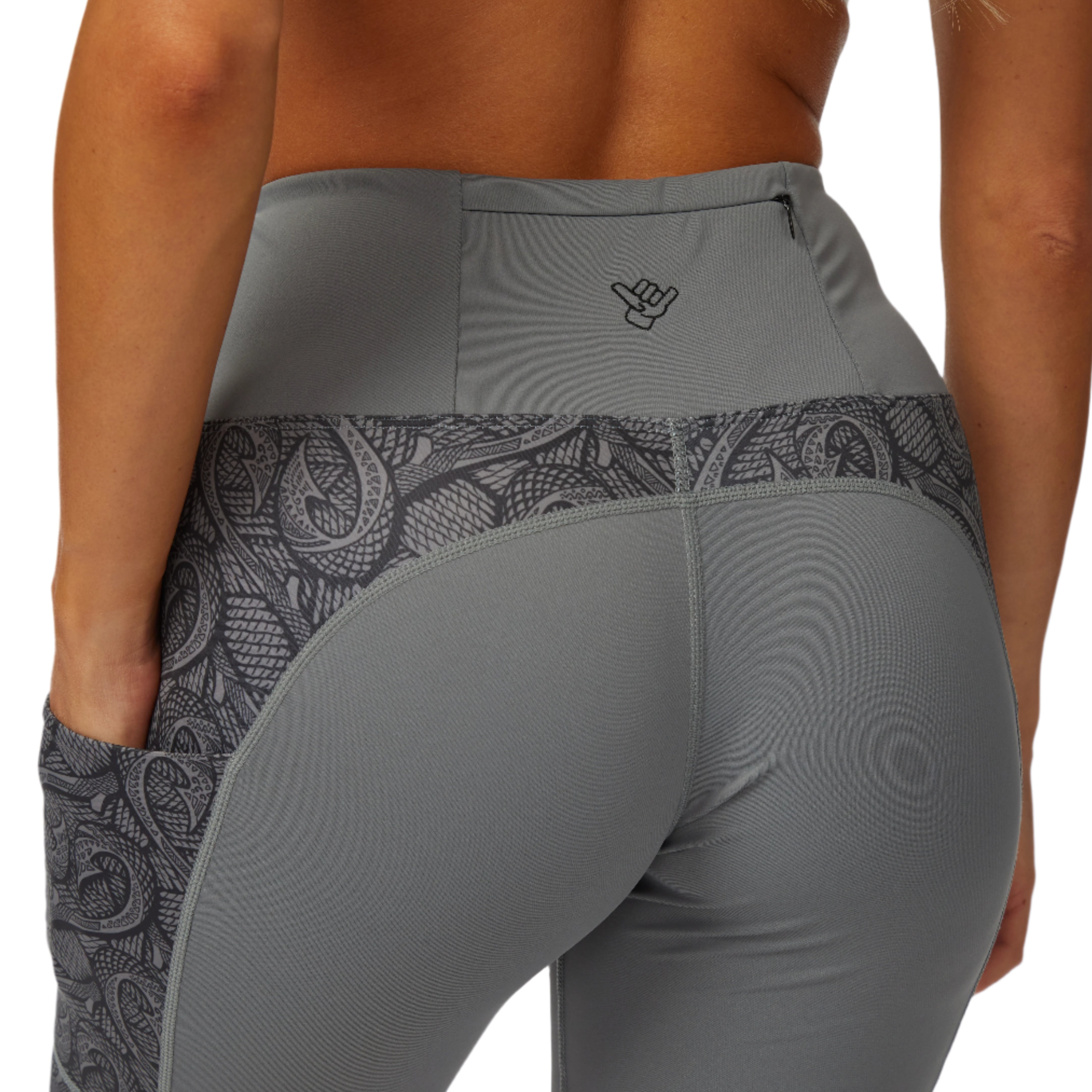 Makau Leggings showcasing back view, highlighting soft suede texture and dual side pockets for convenience.