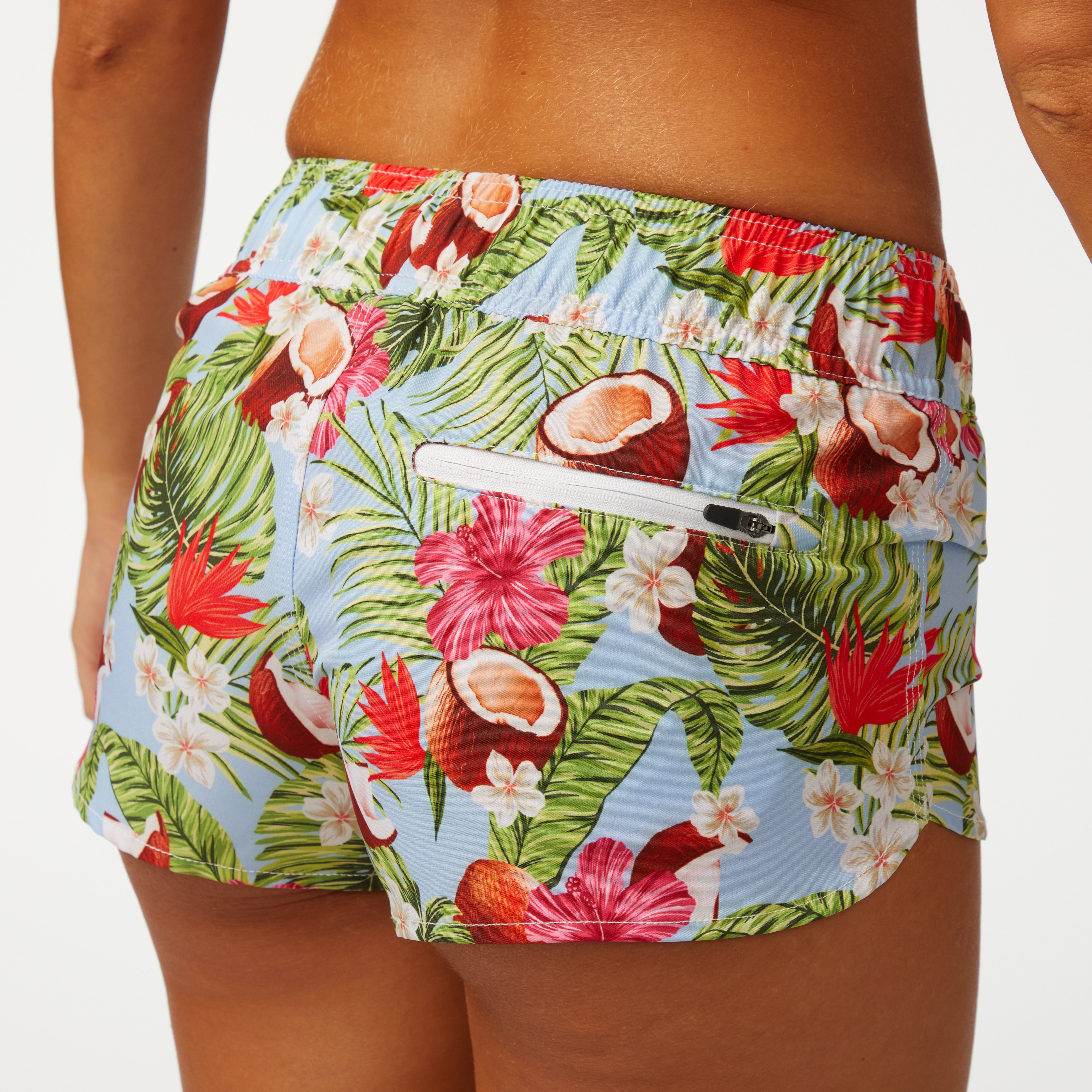 Coco Loco Volley Short showcasing a floral pattern and zipper pocket, designed for comfort and flexibility.
