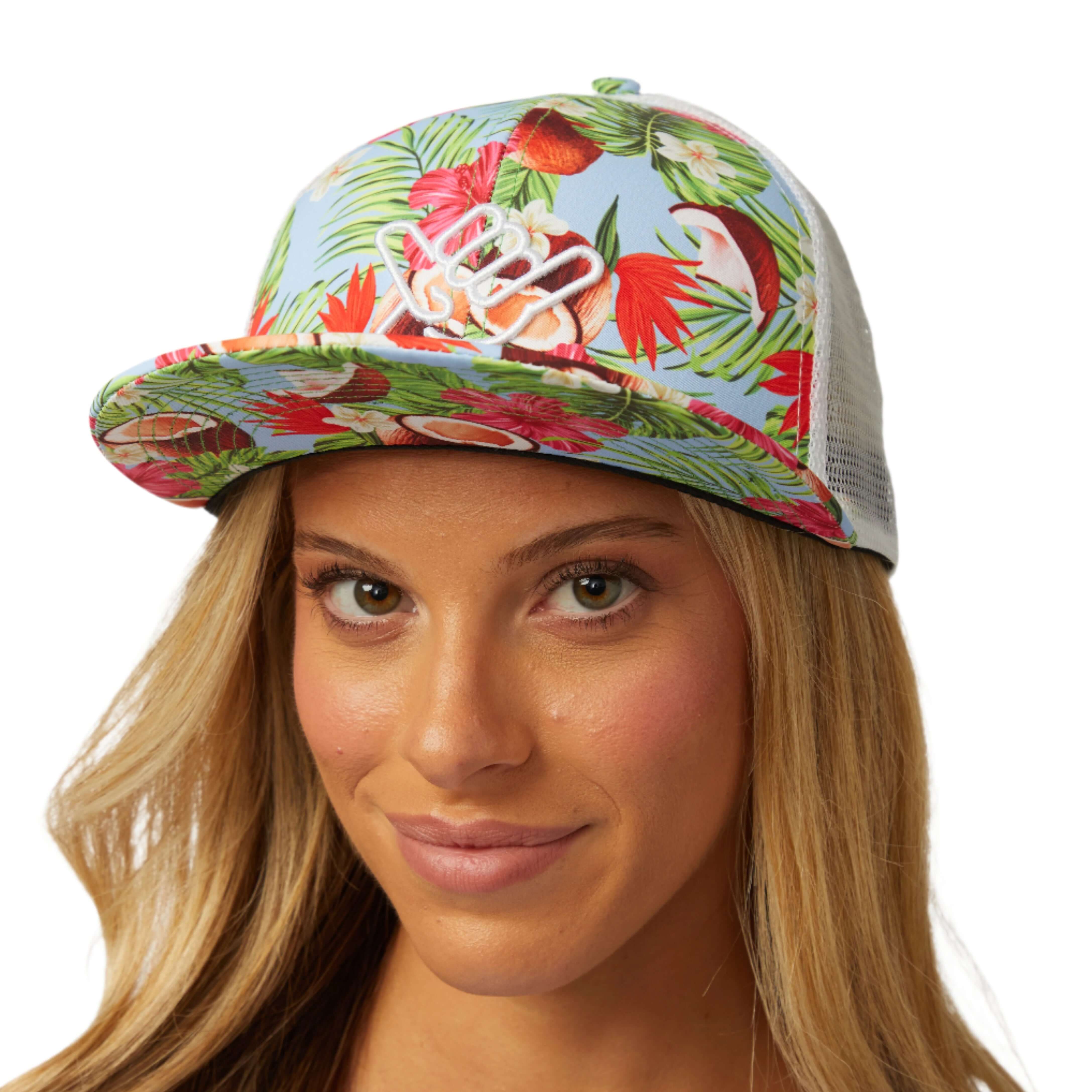 Coco Loco Trucker Hat featuring tropical floral design and flat visor for stylish sun protection.