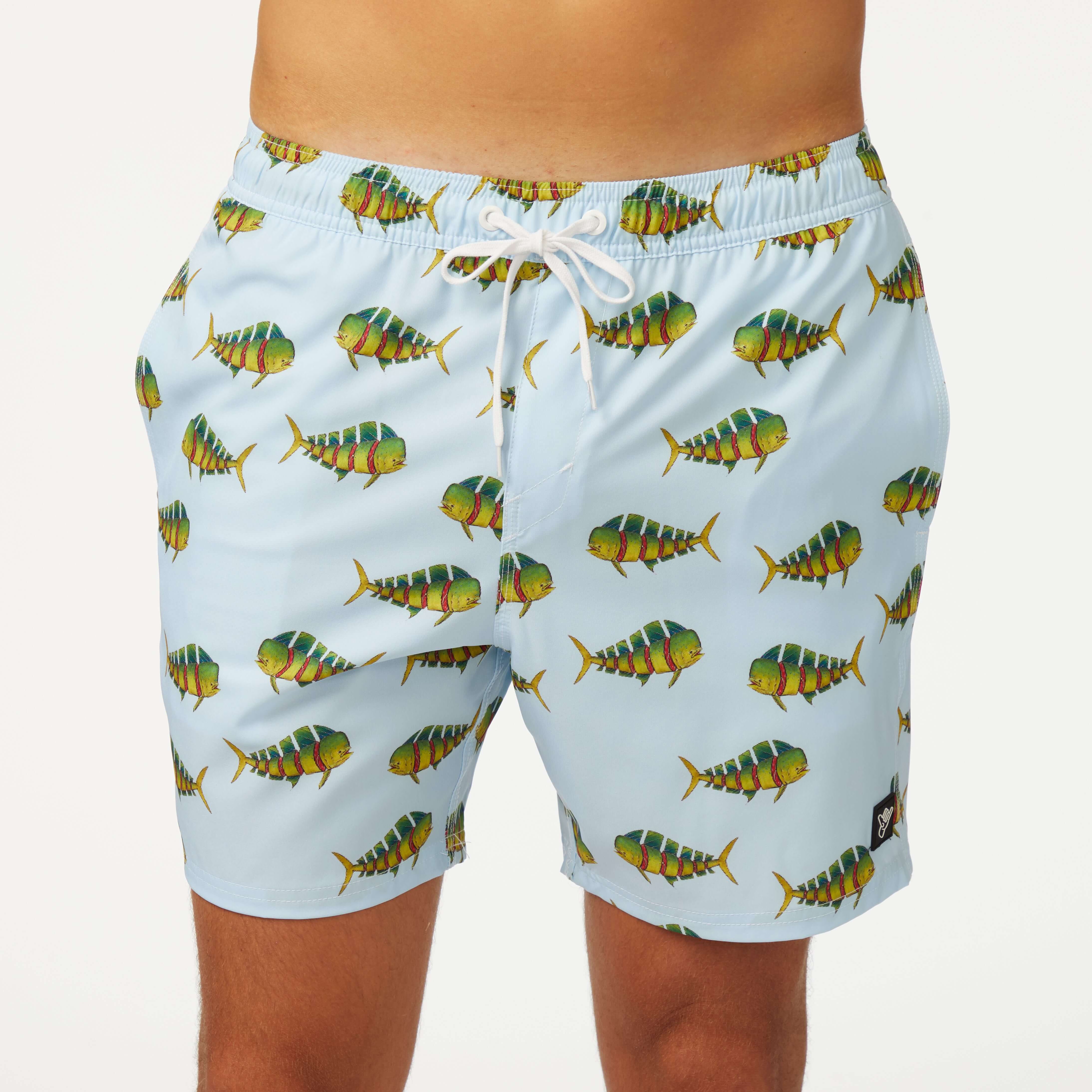 DaveL Shaka-Shimi Mahi Volley Short featuring colorful mahi-mahi fish artwork on a light blue background.