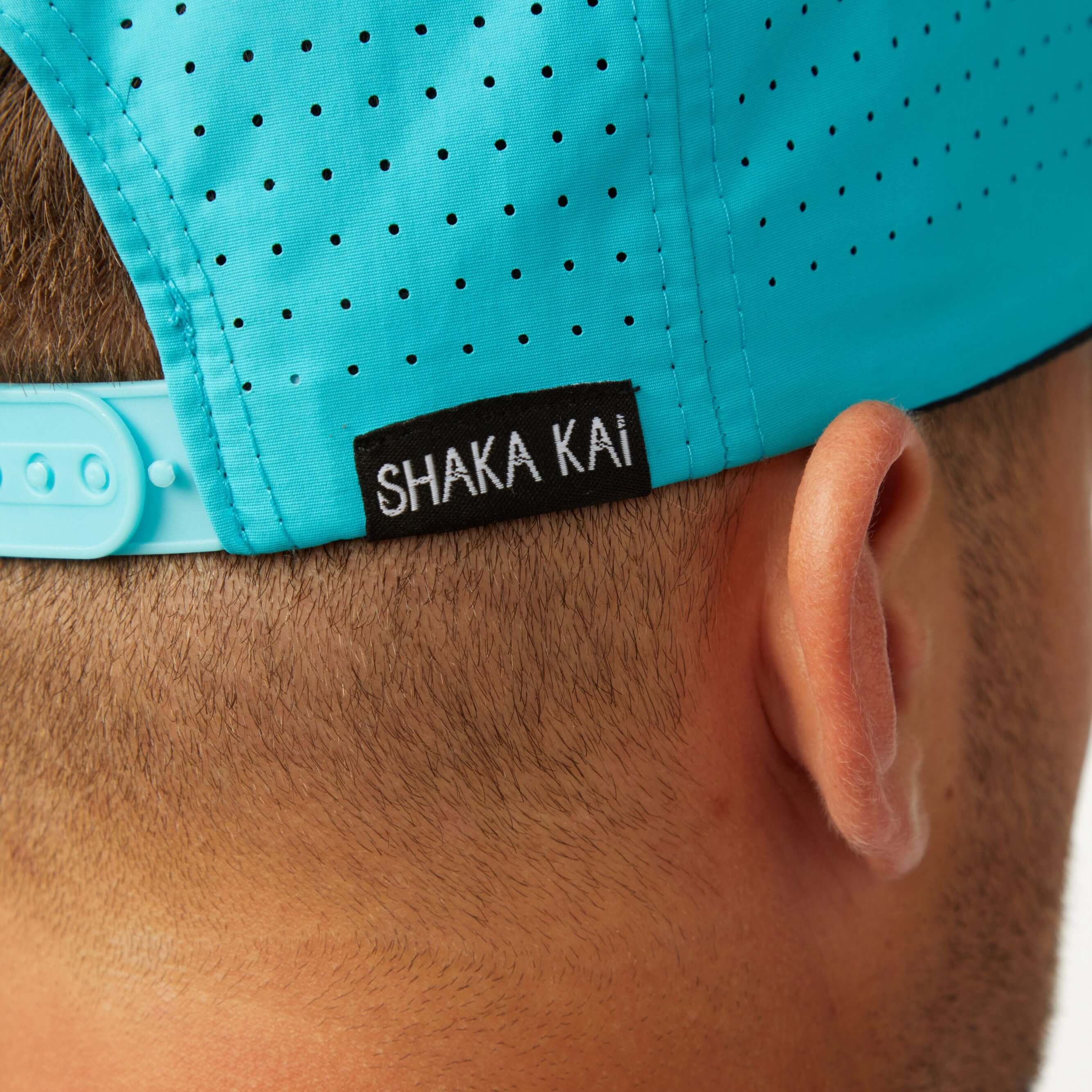 DaveL Shaka-Shimi Mahi Ultra Fit hat with Shaka Kai patch detail on a stylish blue cap.