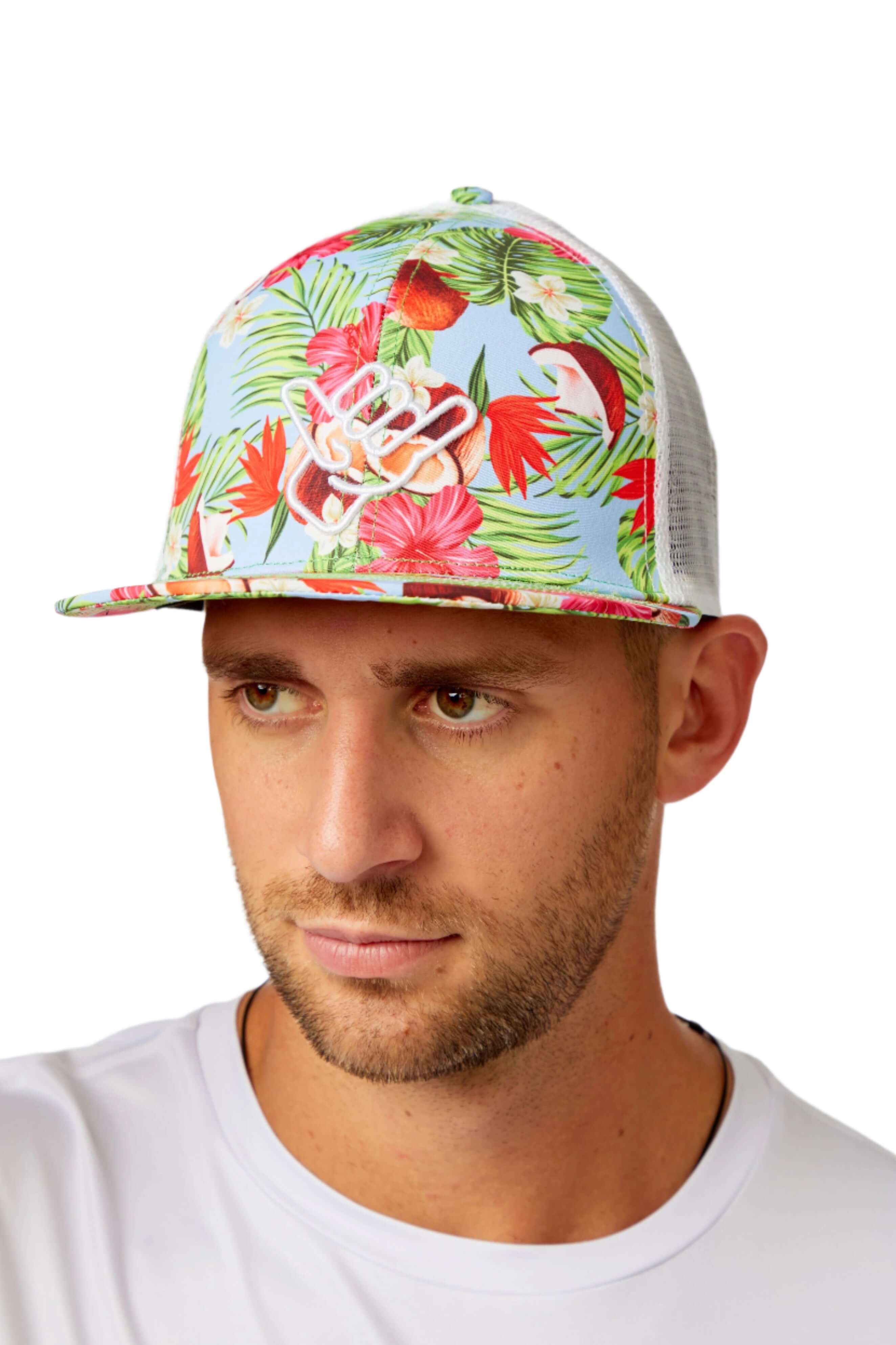Coco Loco Trucker Hat with tropical floral design, perfect for beachside adventures and casual style.
