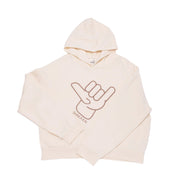 Icon Womens Hoodie in cream with Shaka Kai graphic design, perfect for everyday comfort and stylish layering.
